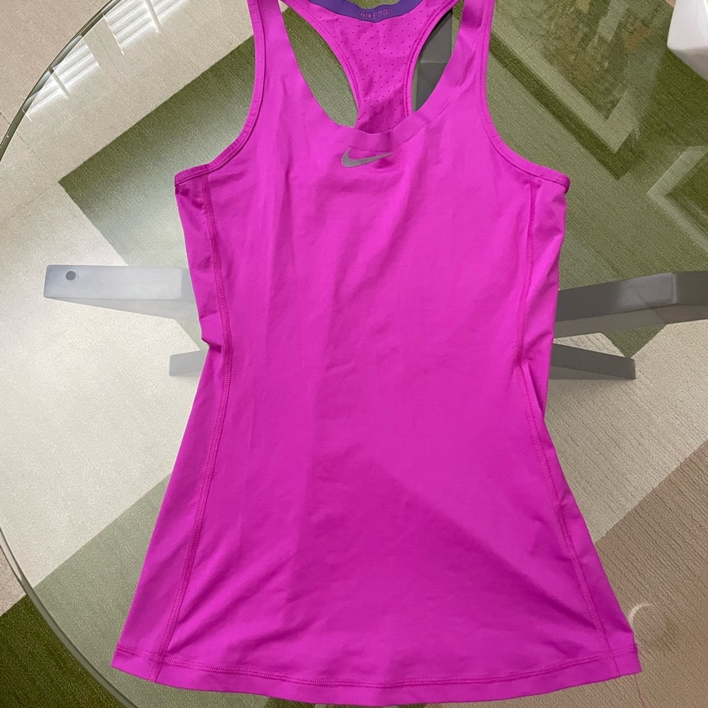 Nike Pro Dri-fit workout top. Beautiful color, perfect used condition. Small